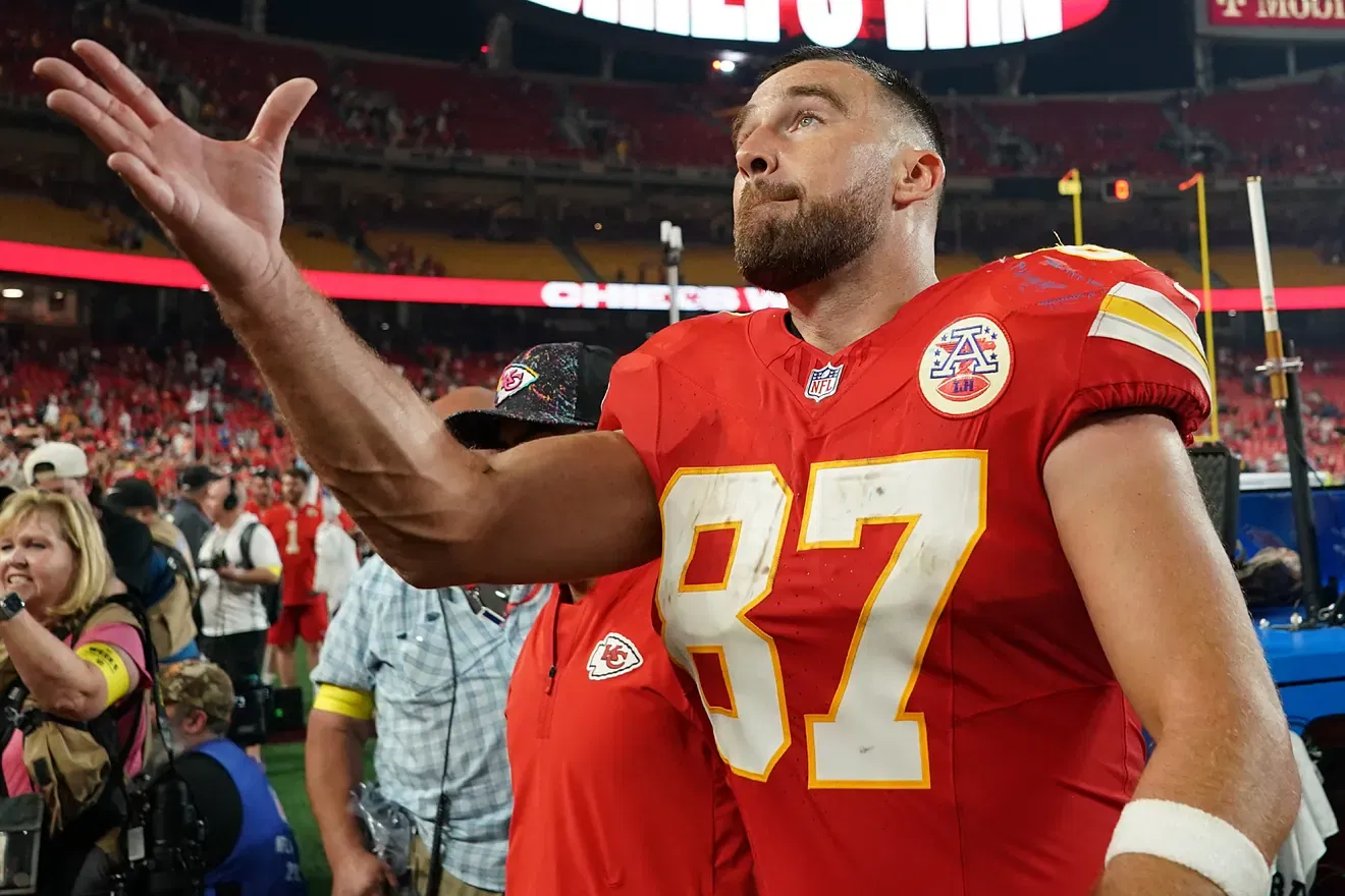 Travis Kelce Turns Heads in Bold Orange Outfit Ahead of Historic Chiefs