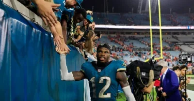 Travis Hunter Was Baptized Ahead Of The Jaguars Game - TMSPN